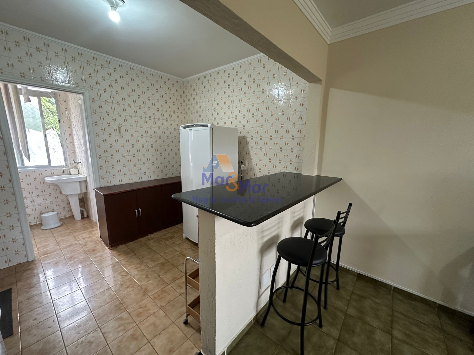 Apartamento na Praia das Pitangueiras, Guarujá - SP