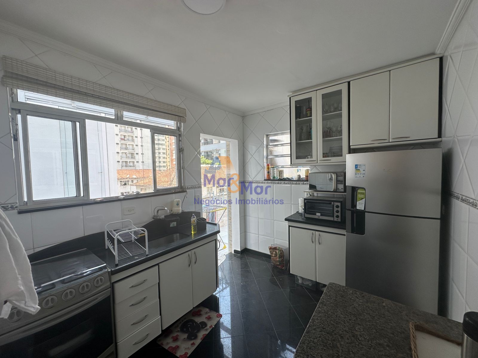 Apartamento na Praia das Pitangueiras, Guarujá - SP