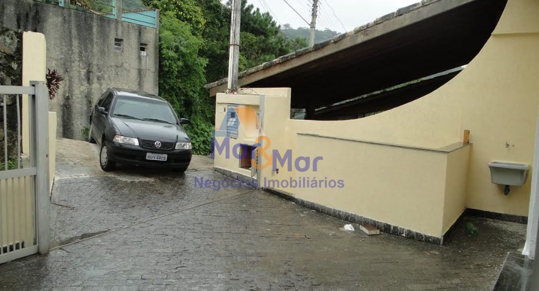 Casa em Condomínio na Praia da Enseada, Guarujá - SP
