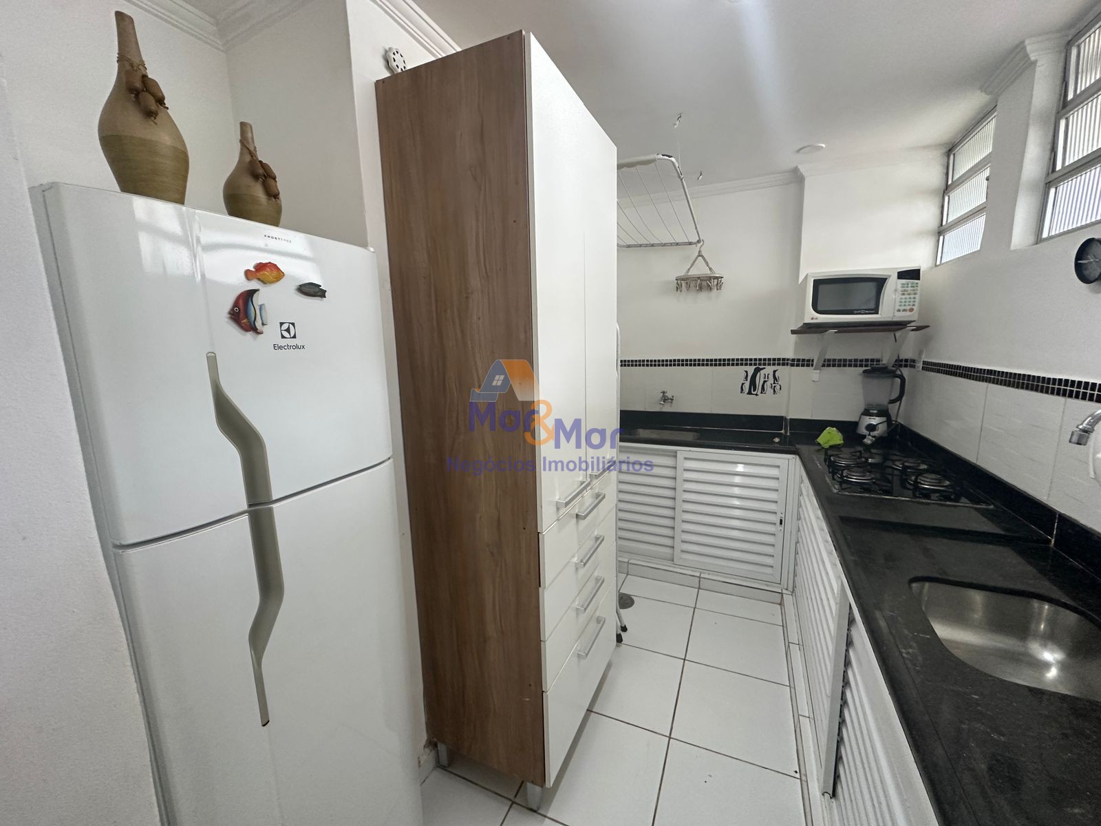 Apartamento na Praia das Pitangueiras, Guarujá - SP