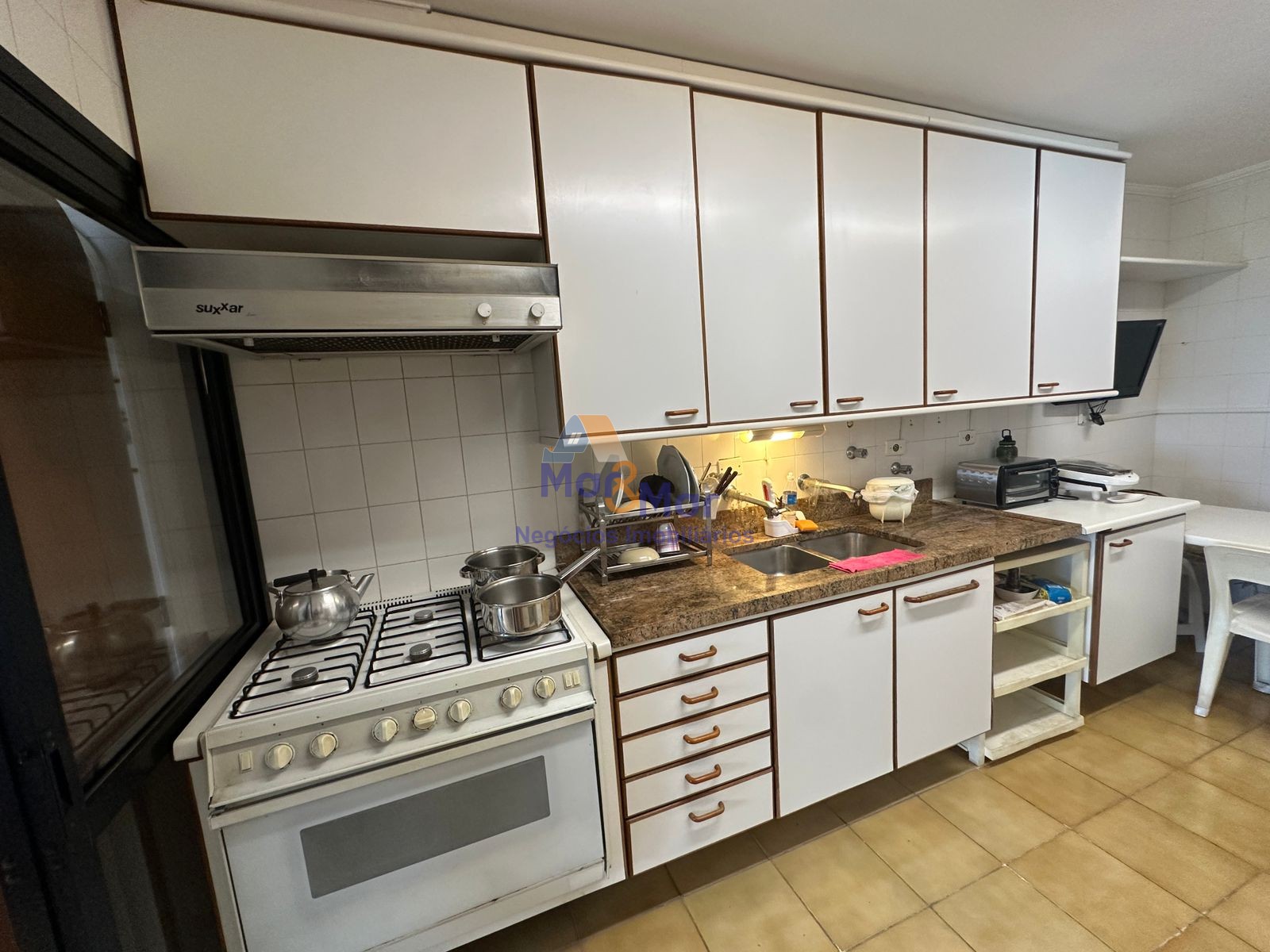 Apartamento na Praia das Pitangueiras, Guarujá - SP