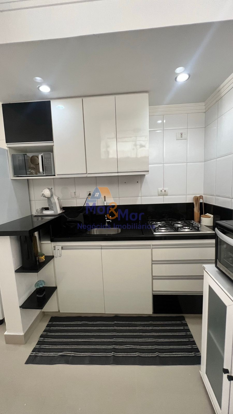 Apartamento na Praia das Pitangueiras, Guarujá - SP