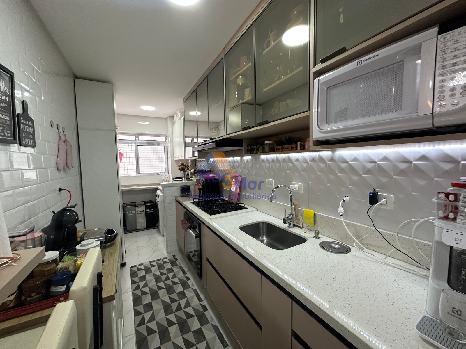 Apartamento na Praia das Pitangueiras, Guarujá - SP